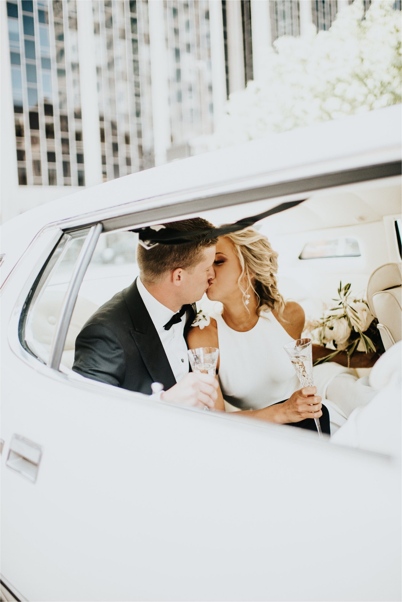  antique car getaway exit thunderbird bride groom wedding couple north loop downtown minneapolis minnesota  