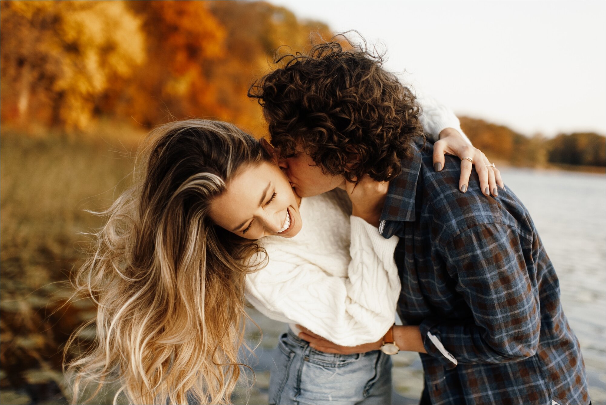  lake dock engagement session autumn fall october november september engaged photos laughing happy 